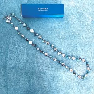 Beautiful 22” Lia Sophia necklace NWT. Silver colored shell and other beads.
